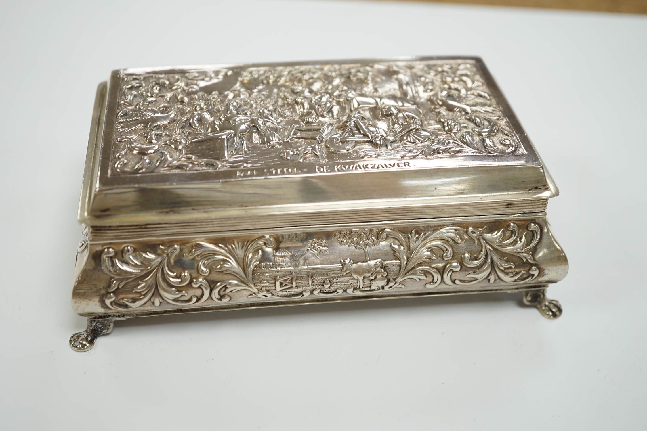 A late 19th century Dutch white metal bombe shaped rectangular trinket box, 14cm, together with an Edwardian silver trinket box, London, 1908.